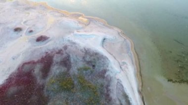 A stunning bird`s eye view of the Black Sea sandy shore with foamy blue waters