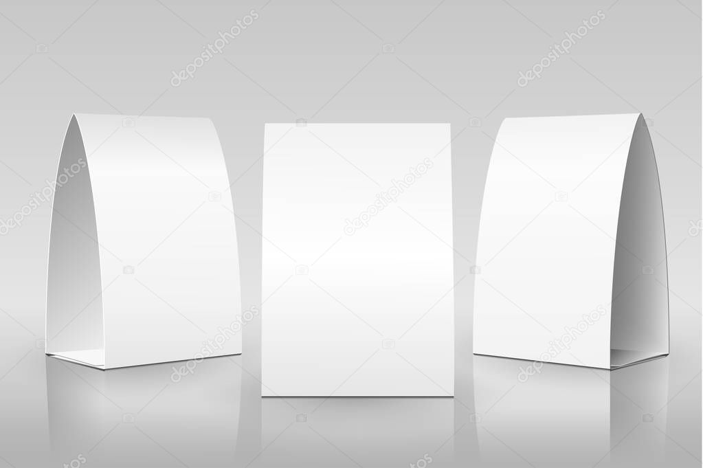 Blank Table Tent isolated on grey background. Paper vertical cards on white background with reflections