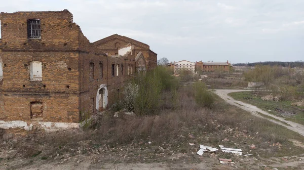 Old abandoned sugar factory in Viinitsia region, aerial view. Broken old factory. Destroyed house