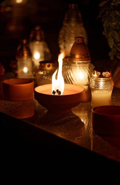 Candles Burning At a Cemetery During All Saints Day