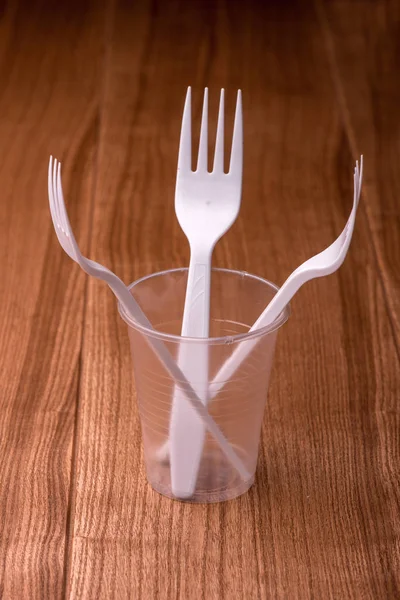 plastic forks closeup. fork on the table