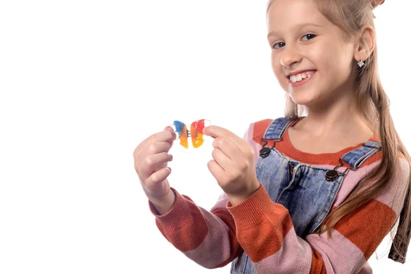 Mała dziewczynka z urządzeniem ortodontycznym izolowane na białym backgr — Zdjęcie stockowe