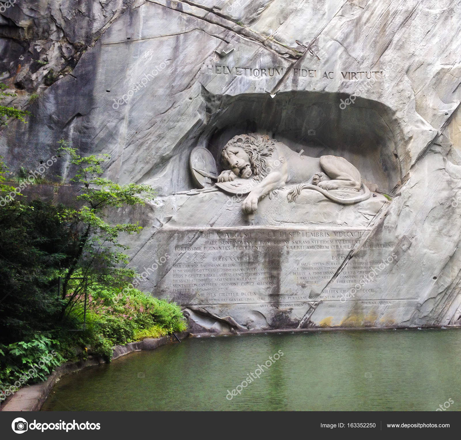 Dying Lion Monument German Lowendenkmal Carved On The Face Of Stone Cliff With The Pond In The Foreground In Luzern Switzerland Europe Stock Photo Image By C Victorflowerfly