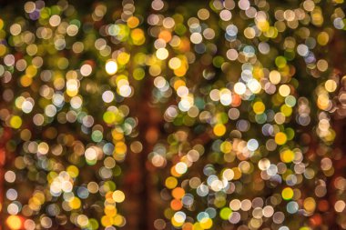 Soyut bulanık renkli parlak ampul arka plan parlayan. Özel etkinlikler, tatil, festivaller duvar kağıdı dekorasyon zemin kavramı. Kutlamalar için parlak ışık görüntü.