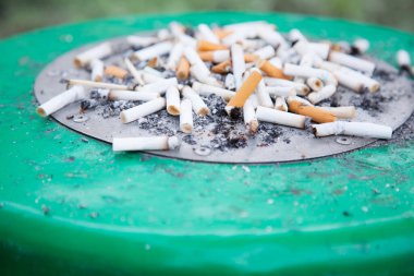 A cigarette filter (filter tip, cigaret butt) is component of a cigarette, along with cigarette paper, capsules and adhesives. It does not make cigaret less unhealthy. Smoking designated area concept