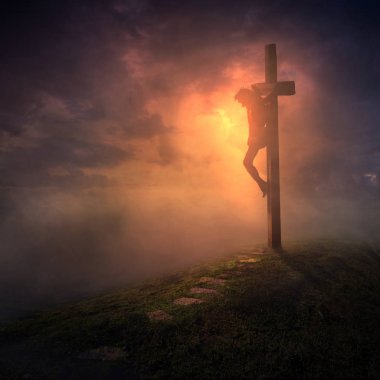 The cross with dark skies clipart