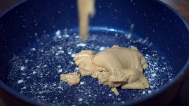 4K Cake Baker Adding Mixture Dough in Pan for Baking — Stock Video