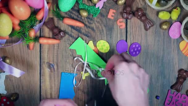 4K Easter Time-lapse From Above Of Hands Making Decoration — Stock Video