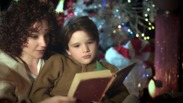 Christmas New Year Holiday Mom Son Reading Book — Stock Video