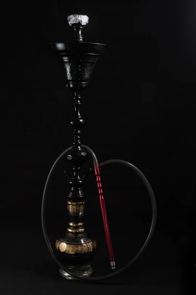 Hookah Tubos contra un fondo negro — Foto de Stock