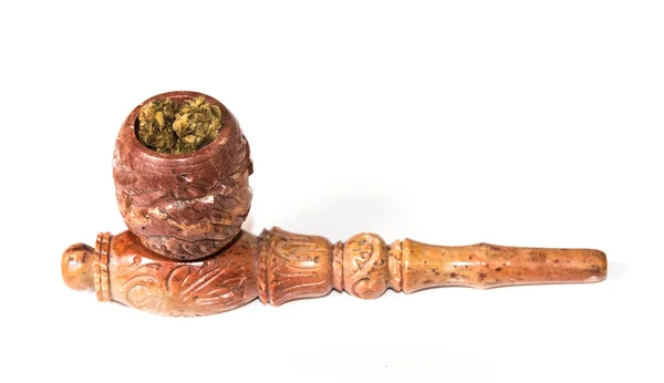 Medical and Recreational Marijuana in a stone pipe — Stock Photo, Image