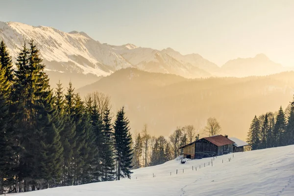 Splendid view from wooden cabin to the alpine mountains of Allgau Alps, Bavaria, Germany. — Stock Photo, Image