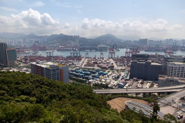 Container port vast Hong Kong harbour with industrial district