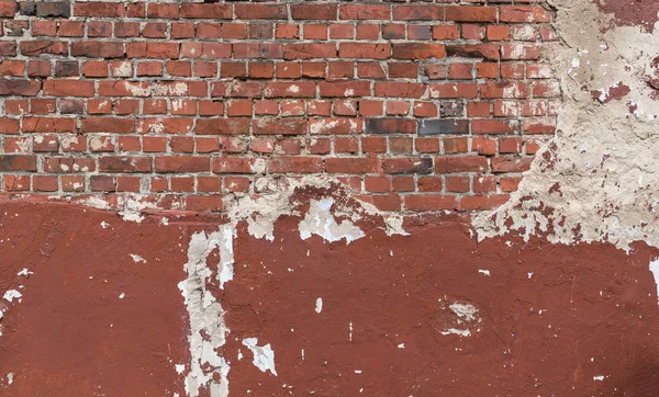 Partially plastered old vintage brick wall texture background — Stock Photo, Image