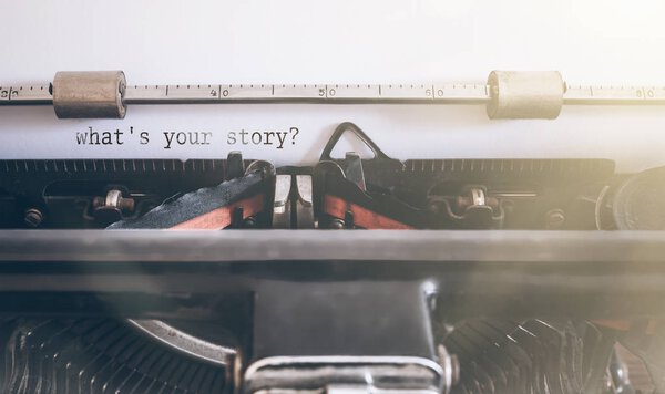 what's your story? written on vintage manual typewriter