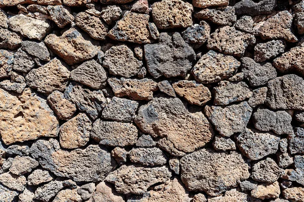 Close-up shot van een droge stenen muur van vulkanisch gesteente — Stockfoto