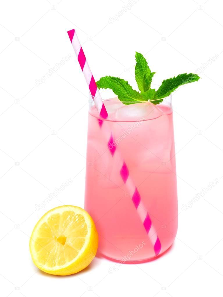 Glass of pink lemonade with mint and straw isolated on white