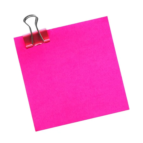 Roze notitie met paperclip geïsoleerd op wit — Stockfoto