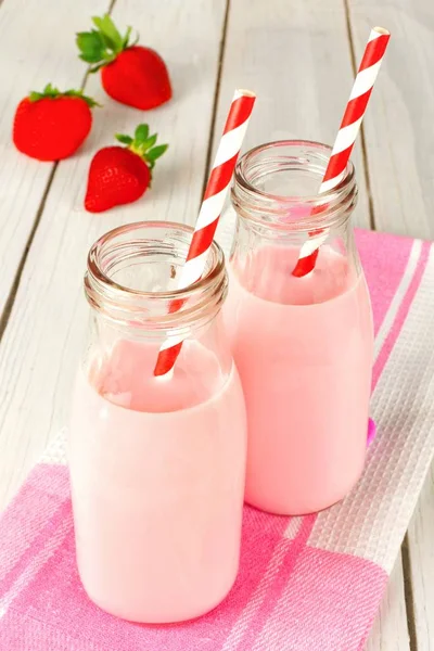 Strawberry Milk Traditional Bottles Straws White Wood Table — Stock Photo, Image