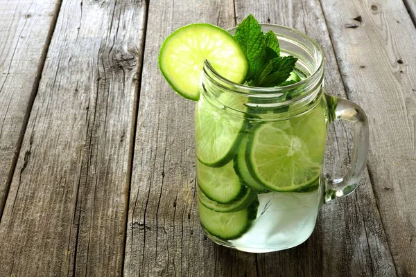 Detox water with lime and cucumbers