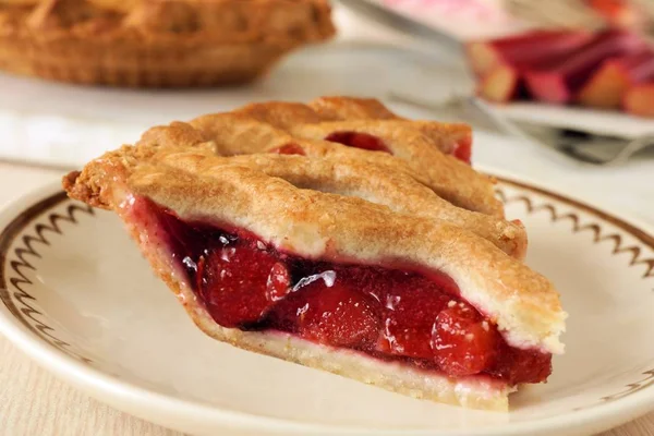 Piece of fresh strawberry and rhubarb pie — Stock Photo, Image