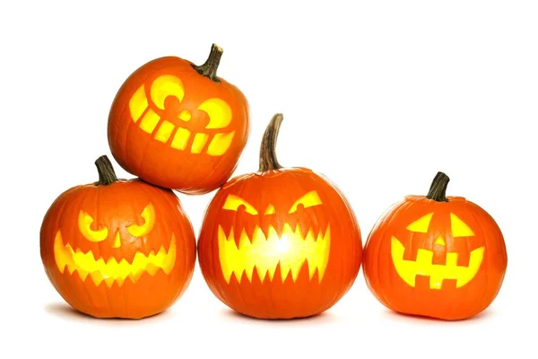 Grupo de Halloween iluminado Jack o Linternas aisladas en blanco —  Fotos de Stock