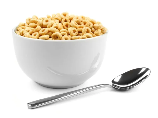 Cuenco de cereal de avena con cuchara aislada sobre blanco —  Fotos de Stock