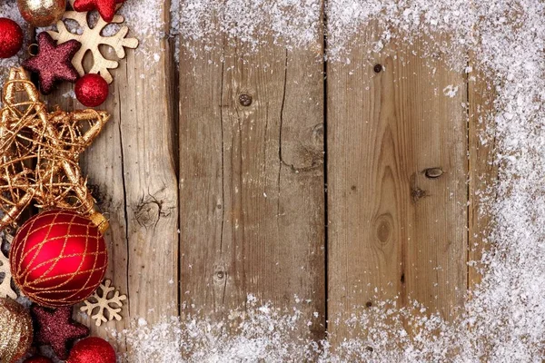 Rött och guld jul prydnad sida gränsen över trä — Stockfoto