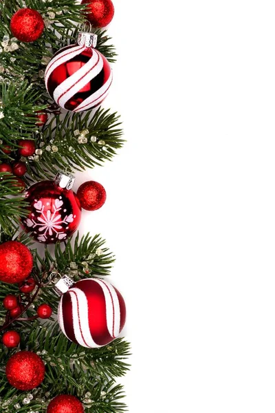 Red and white Christmas bauble border on white — Stock Photo, Image