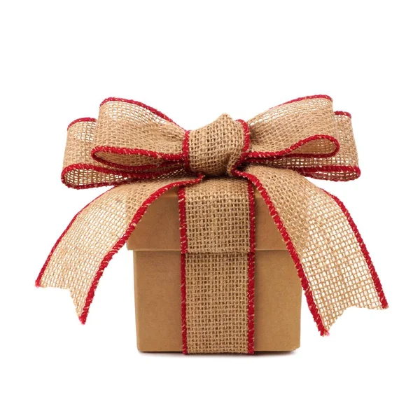 Brown gift box with rustic burlap bow and ribbon — Stock Photo, Image