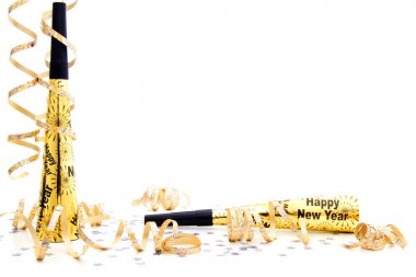 New Years Eve party noisemaker border with confetti and streamers over a white background clipart