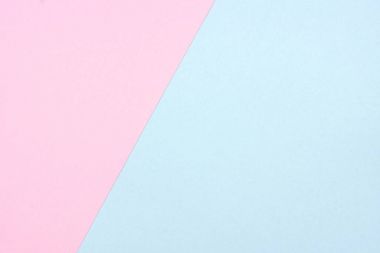 Pastel pembe ve mavi kağıt doku arka plan. Merkezi kapalı, açı.