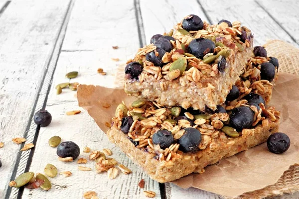 Two Stacked Superfood Breakfast Bars Oats Blueberries Side View Rustic — Stock Photo, Image