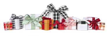 Assortment of many Christmas gift boxes isolated on a white background