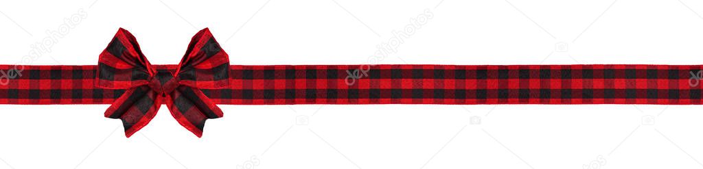 Red and black buffalo plaid Christmas gift bow and ribbon. Long border isolated on a white background.