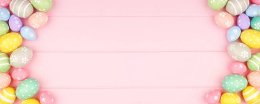 Pastel renkli yumurta kaplı Paskalya bayrağı. Pembe ahşap arka planda çifte kenar. Kopyalama alanı ile görünümün üstünde.