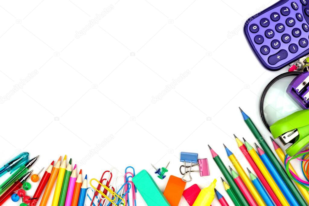 Colorful school supplies corner border against a white background