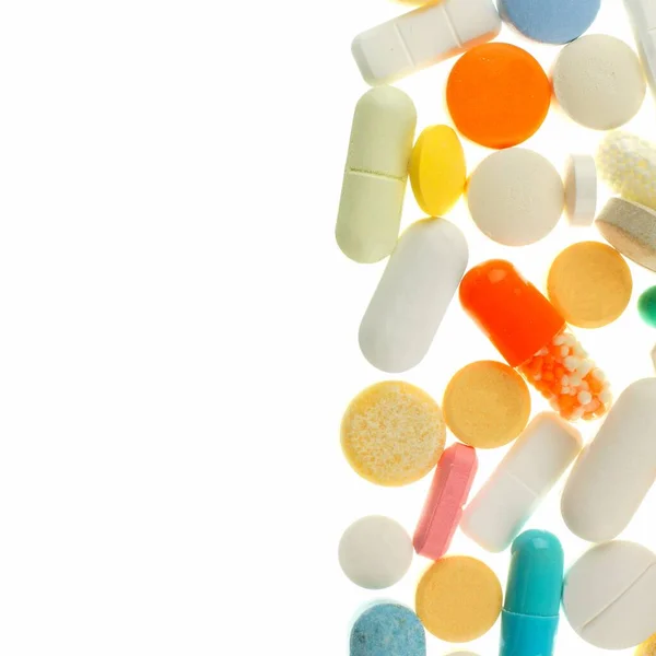 Borda Vertical Medicamentos Variados Isolados Branco — Fotografia de Stock