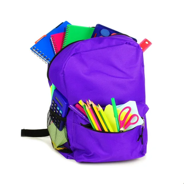 Фіолетовий Рюкзак Повний Шкільного Приладдя Білому Тлі — стокове фото