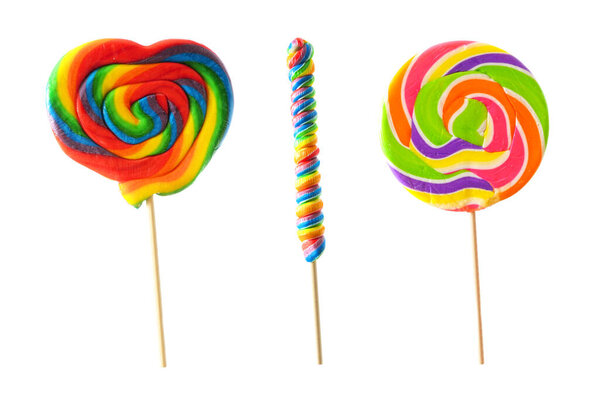 Three unique colorful lollipops isolated on a white background