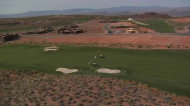 Hava atışı golfçüler çöl ders üzerinde
