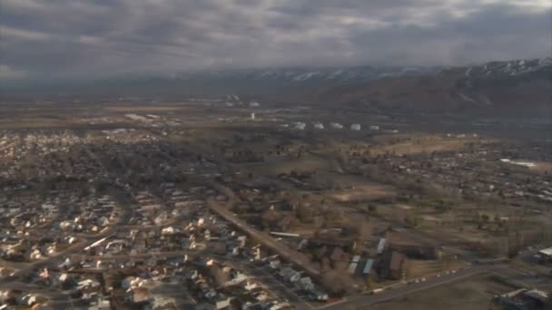 Aerial shot of salt lake city neighborhoods in winter — Stock Video