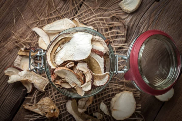 Dried mushrooms in jar. — Stock Photo, Image