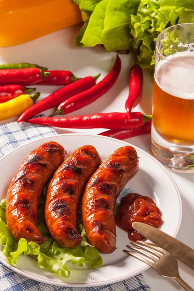 Grilled sausage on a plate. — Stock Photo, Image