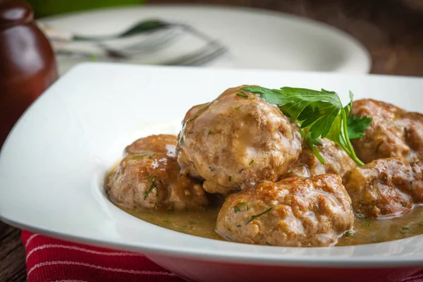 Pork meatballs with dill sauce. — Stock Photo, Image