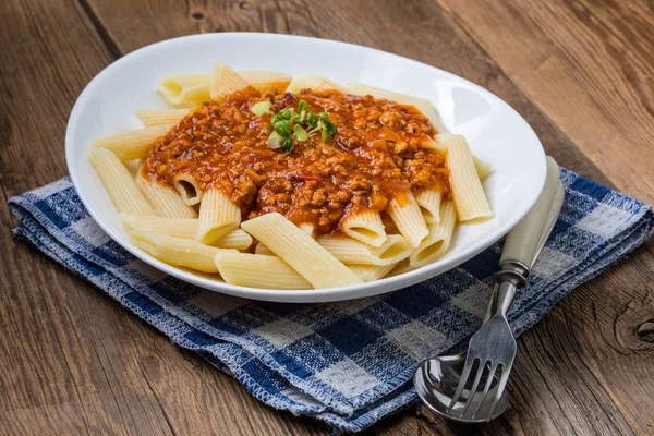 Pasta penne with tomato bolognese sauce. — Stock Photo, Image