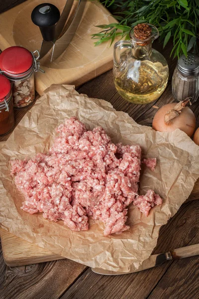 Minced meat on wooden background. — Stock Photo, Image