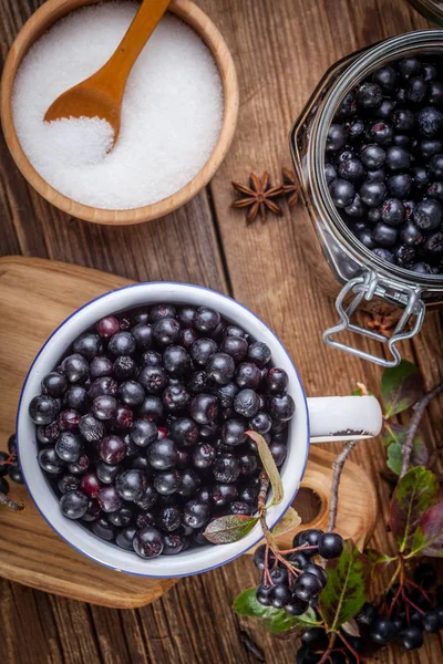 Fruits of black chokeberry prepared for processing. — Stock Photo, Image