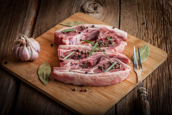 Raw lamb chop ready for frying.