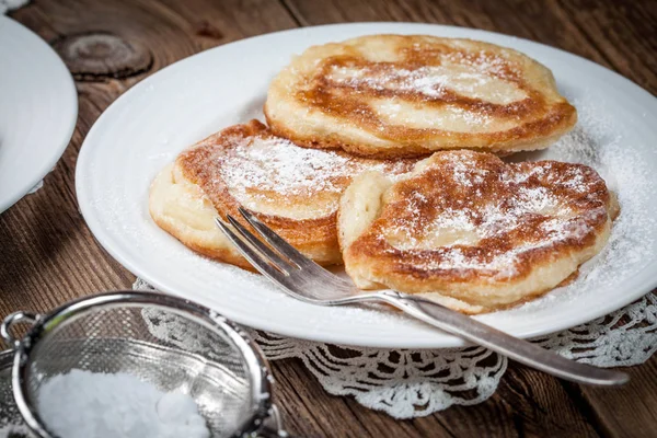 Polish pancakes with powdered sugar. — Stock Photo, Image